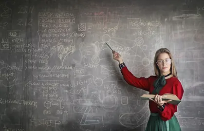 teacher teaching at a blackboard - Credit Limit